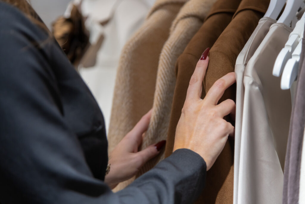 personal styling side hustle: a woman looking for a coat for her client
